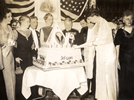 Eleanor Roosevelt cutting the cake